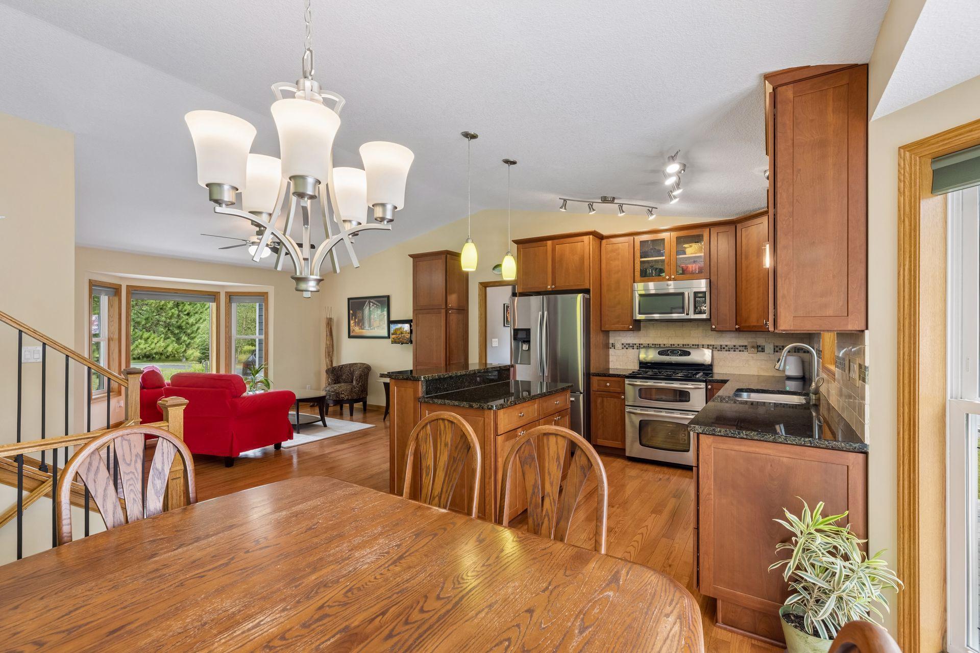 Open concept living with effortless flow between the kitchen, dining, and living spaces. Ideal for entertaining!