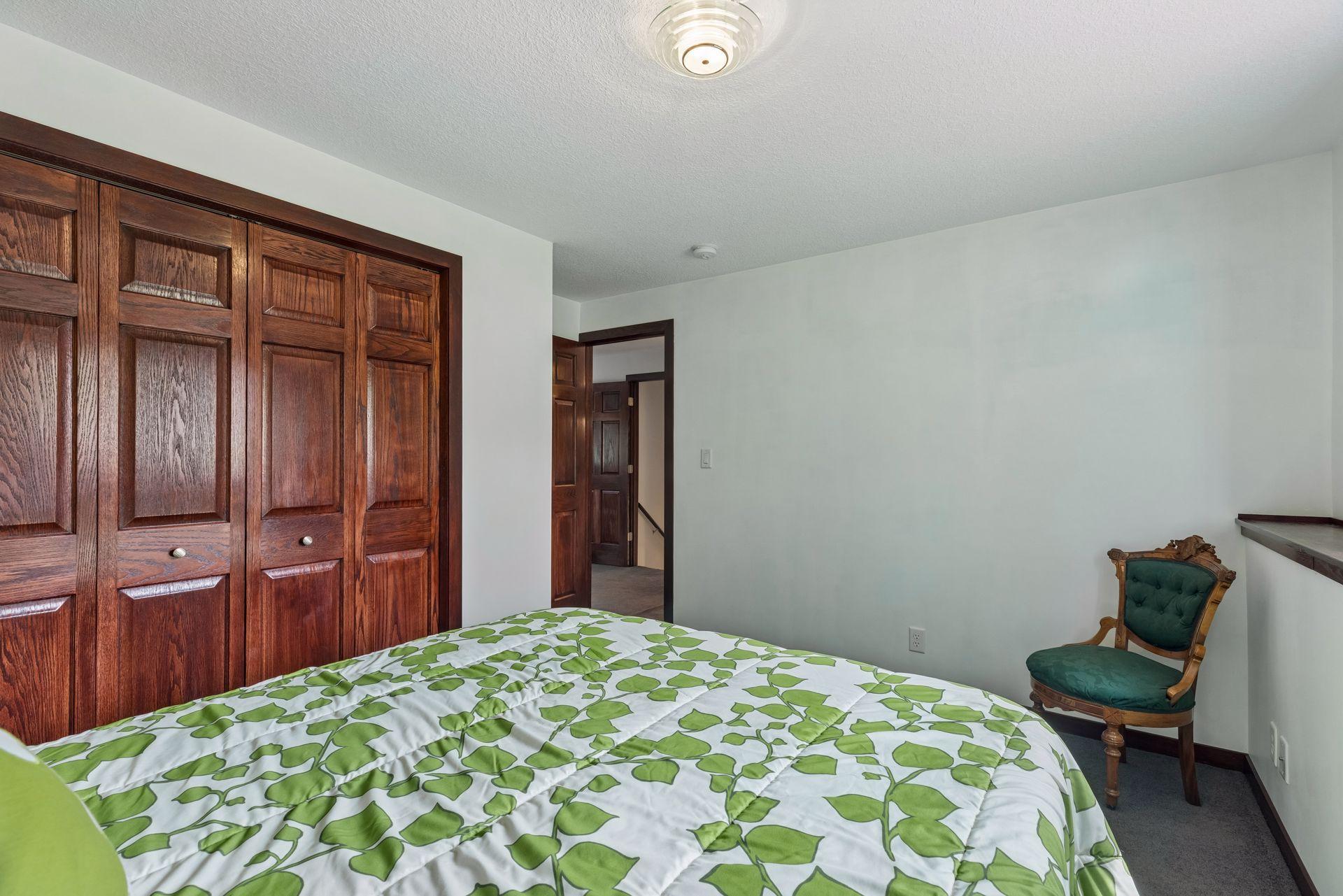 A generous double closet rounds out this lower level bedroom.