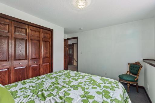 A generous double closet rounds out this lower level bedroom.