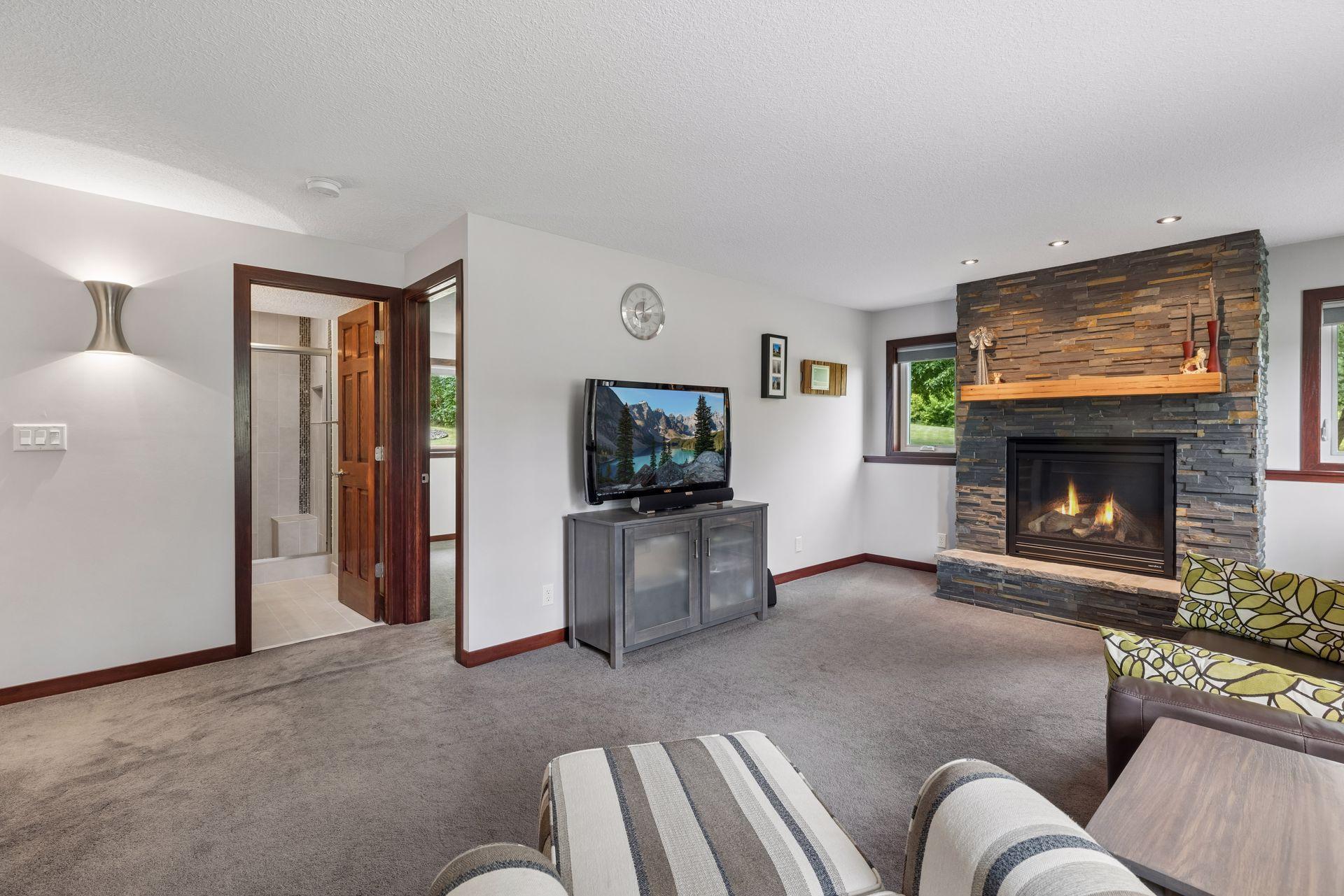 The family room provides access to an additional bedroom and 3/4 bathroom, creating a well appointed lower level living area.
