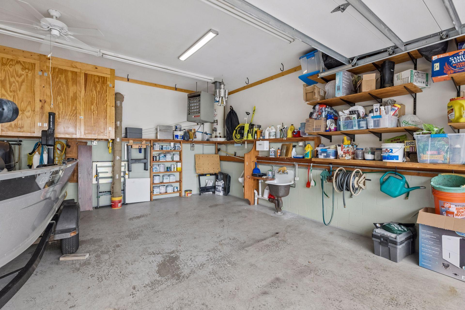 The additional garage is thoughtfully divided, with this section offering both heat and plumbing for added versatility.