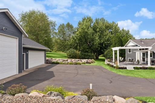 Plenty of parking and storage options! A short walk out the back door to the massive 2nd garage.