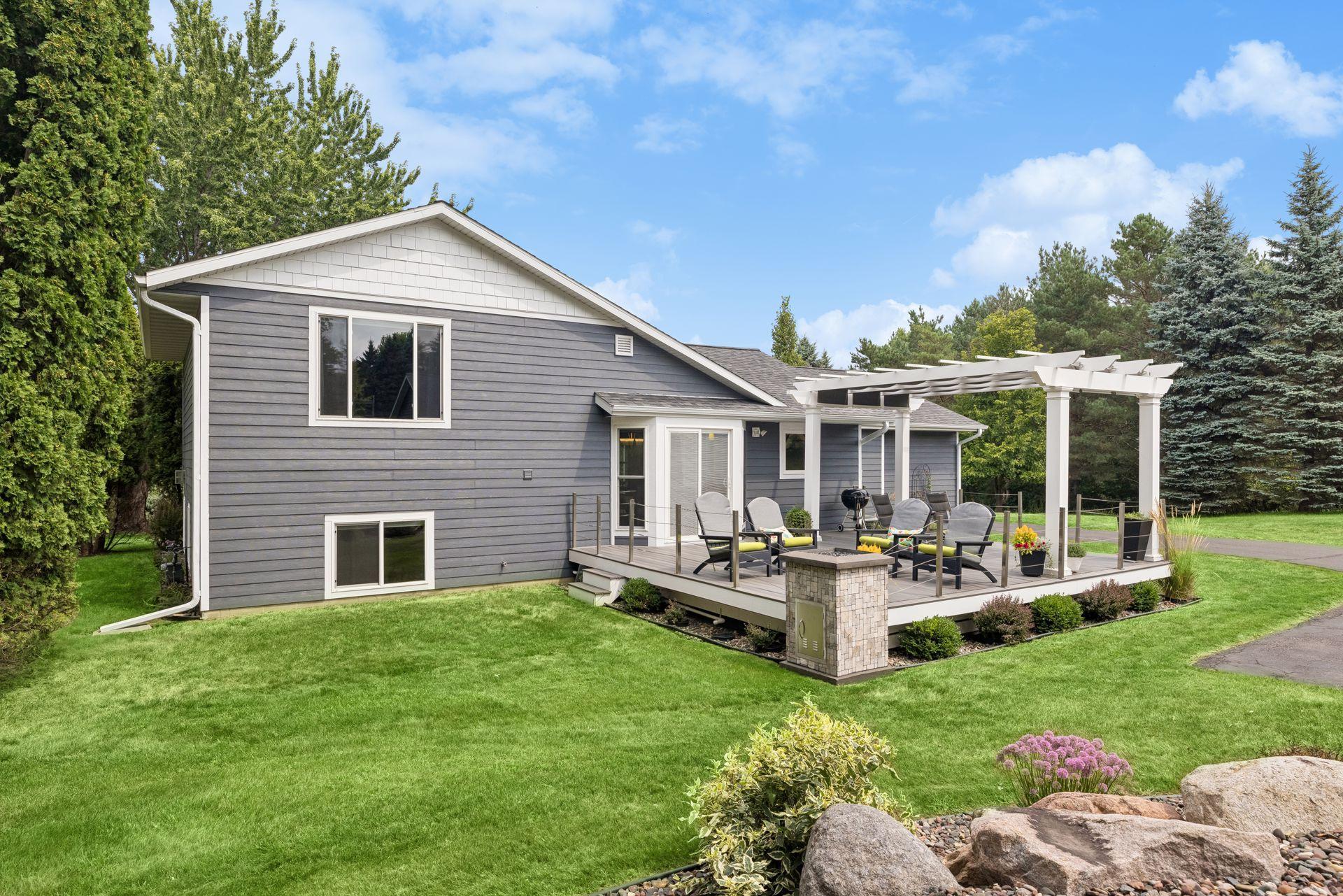 Grill, gather, and enjoy! The fantastic backyard deck connects directly to the kitchen through the sliding glass door, making summer entertaining a breeze.