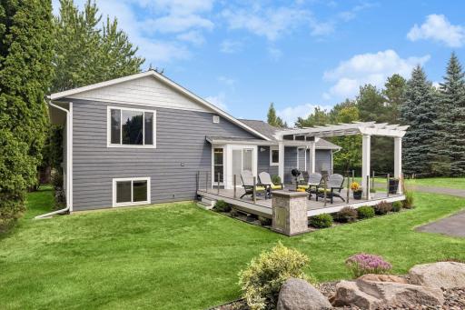 Grill, gather, and enjoy! The fantastic backyard deck connects directly to the kitchen through the sliding glass door, making summer entertaining a breeze.