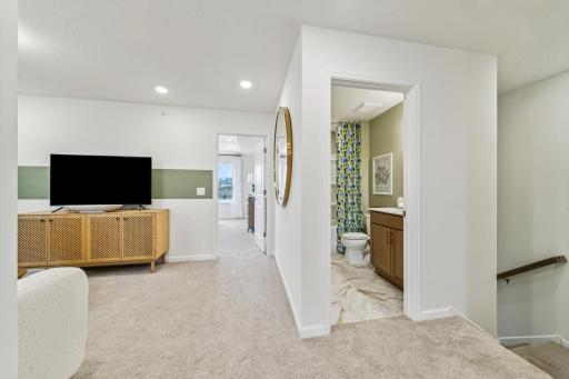 Enjoy the convenience of an upstairs loft with easy access to the secondary bedrooms and full bathroom. *Photo of a previously built home of the same floor plan. Finishes/options may vary.