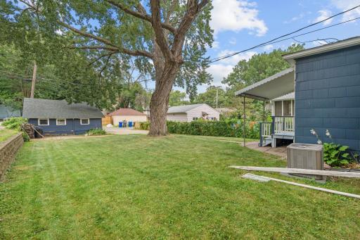 Large partially fenced backyard