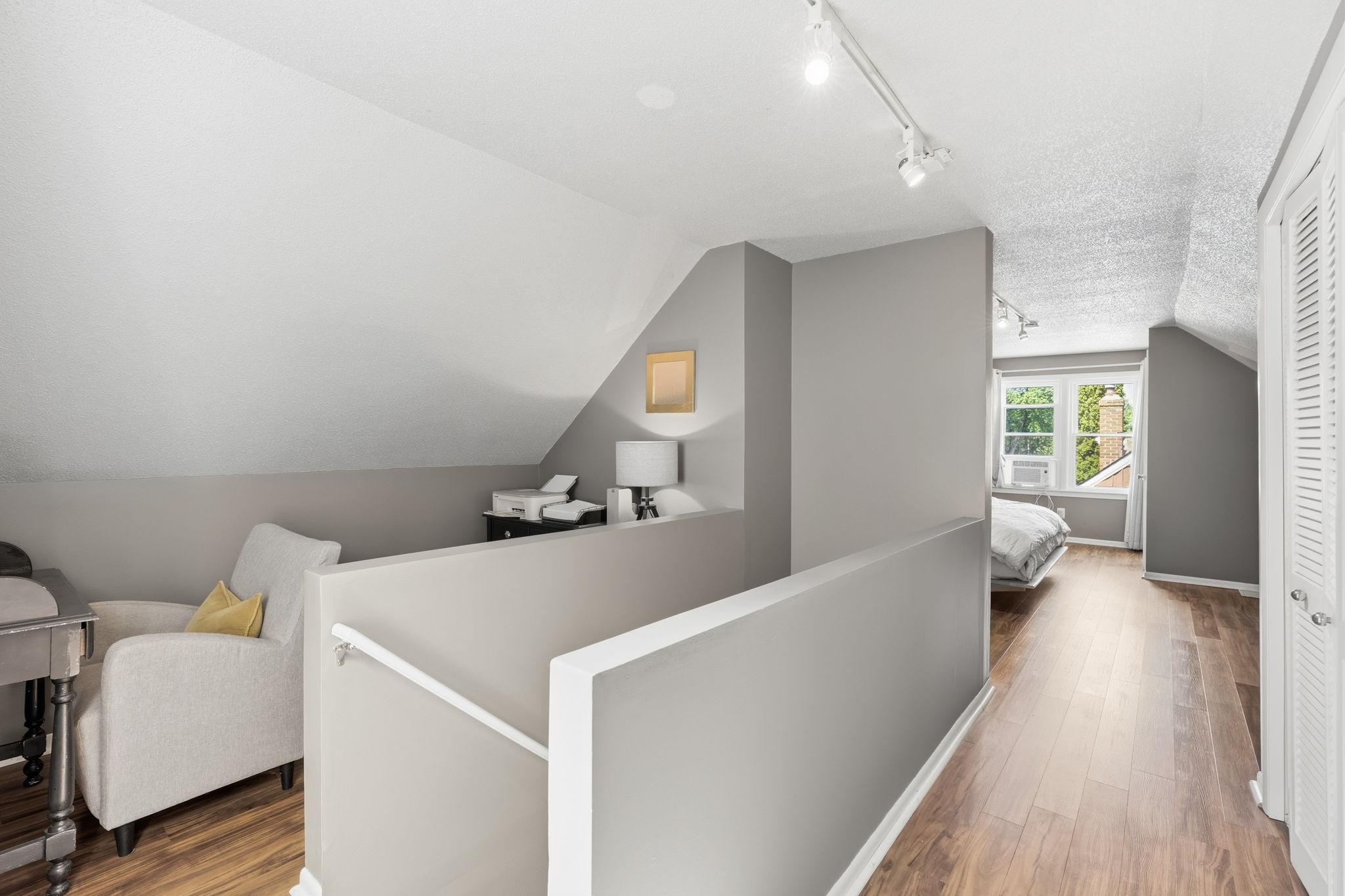 Upstairs is the third bedroom and another option for an office or reading nook.