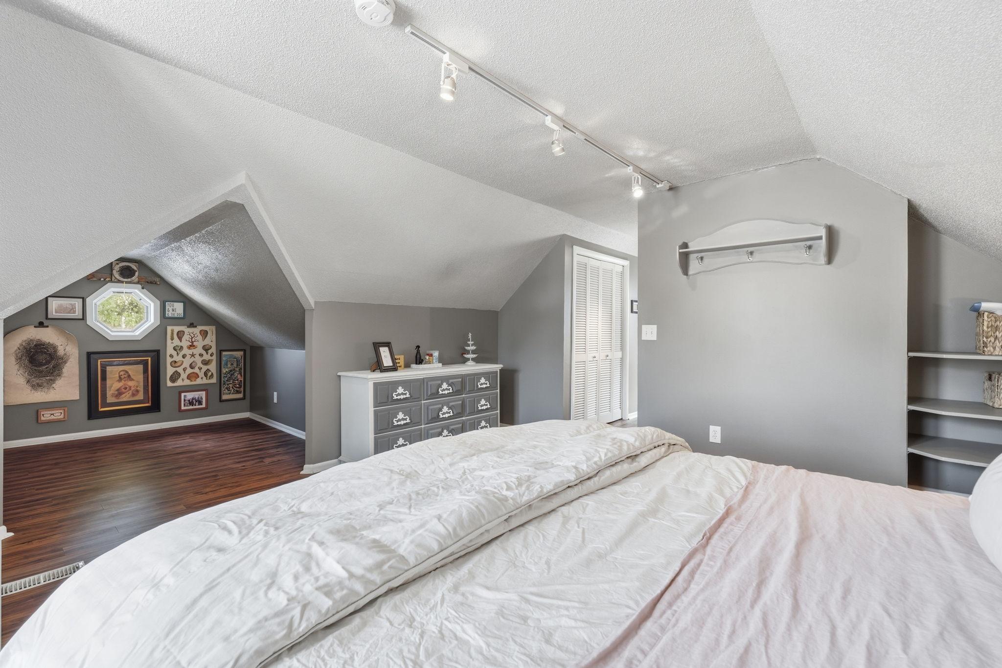 Another option for a cozy reading nook. Closets along the walls as you come up the stairs.
