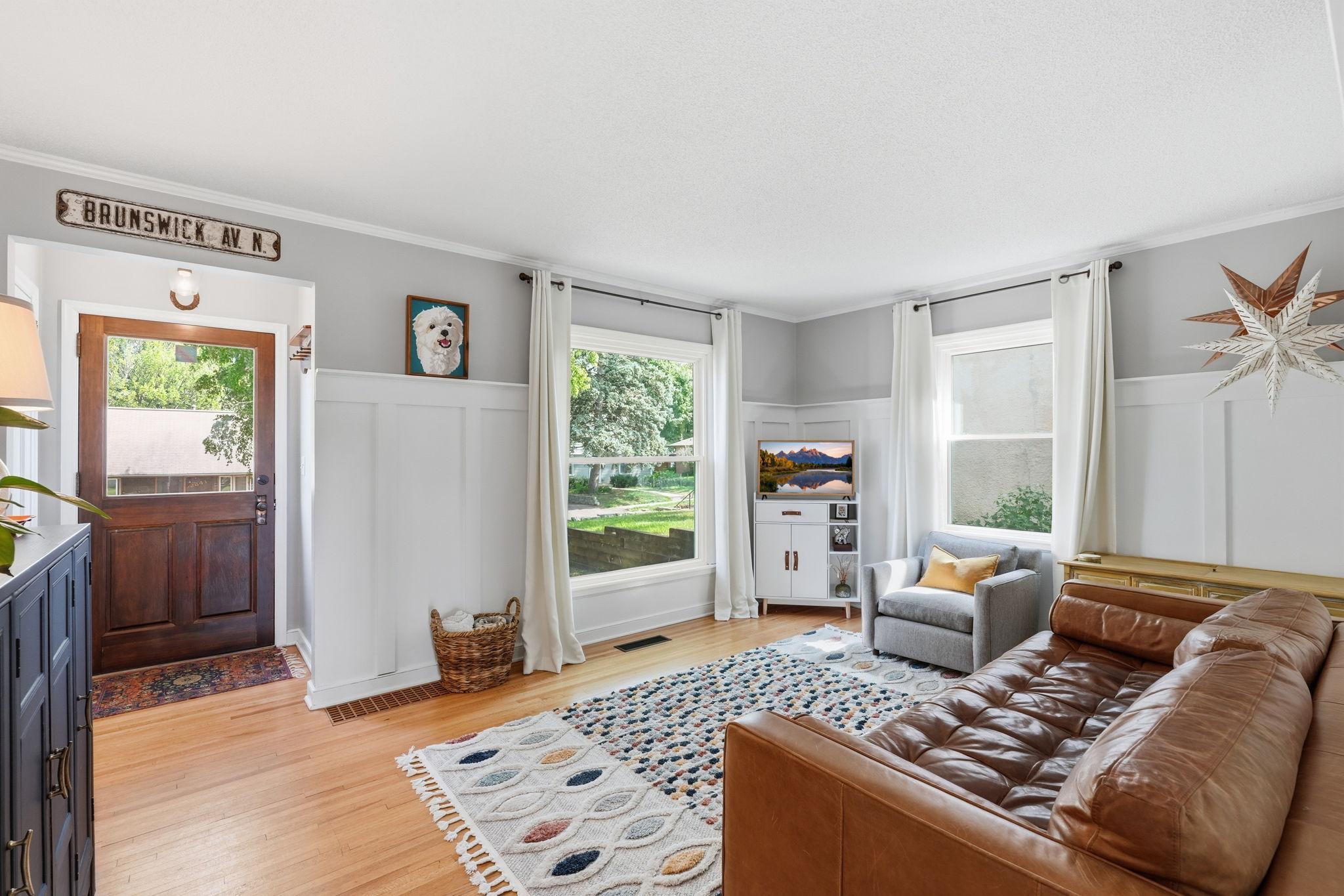 Original hardwood floors throughout the main level living areas