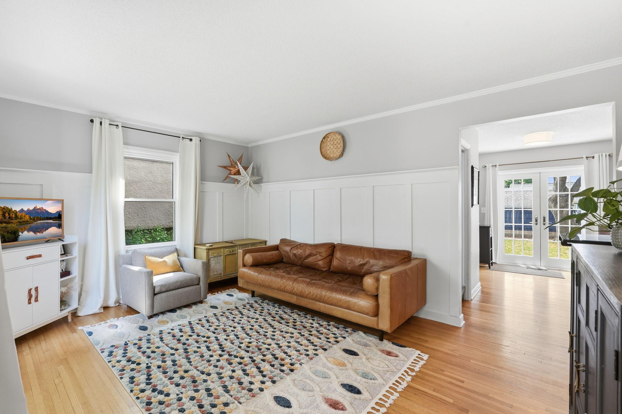 Living room flows easily into the dining area.
