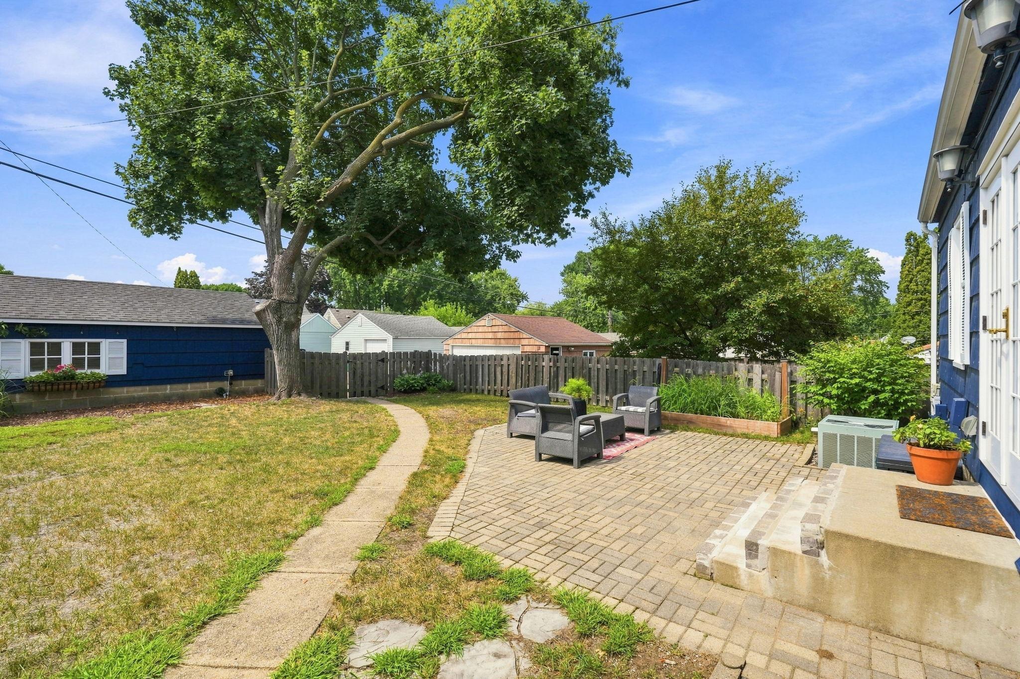 Fenced back yard offers privacy for enjoying your time out on the patio.