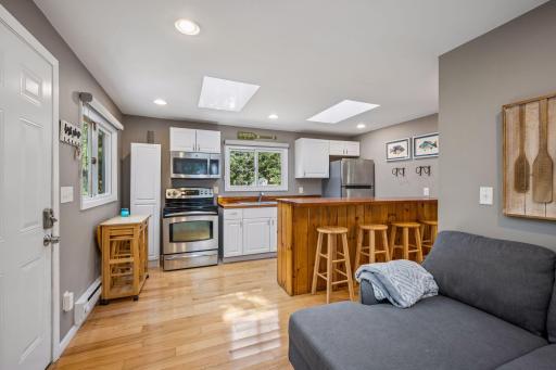 The kitchen and living room have an open concept.