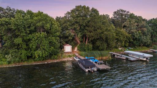 The boathouse is part of the ownership of this home.
