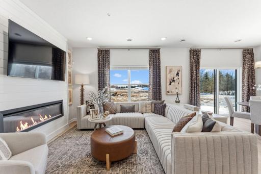 Soak up the sunshine in this bright living room, complete with large windows and plenty of room to relax. *Photo of a previously built home of the same floor plan. Finishes/options may vary.