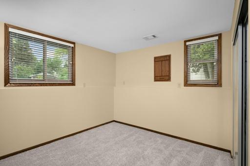 Bedroom 4 is located in the lower level with great windows!