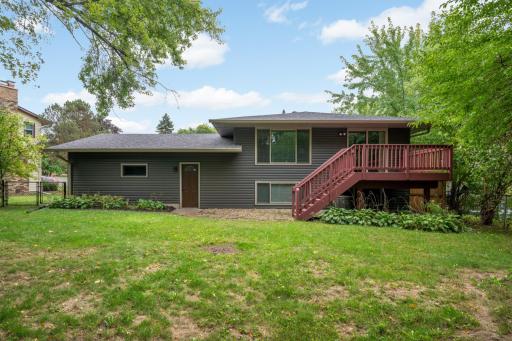 The deck leads to the backyard, great for entertaining!