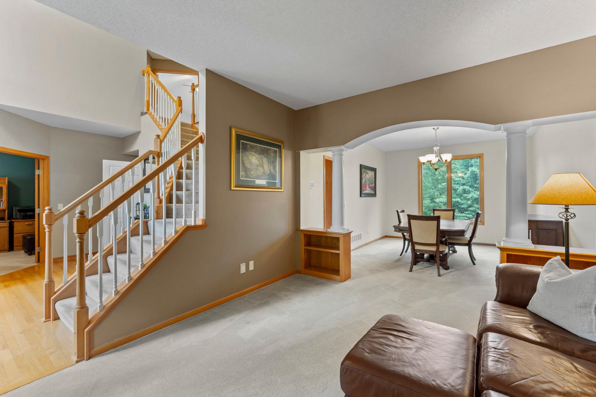 An open layout connects the living and dining spaces while keeping each room distinct