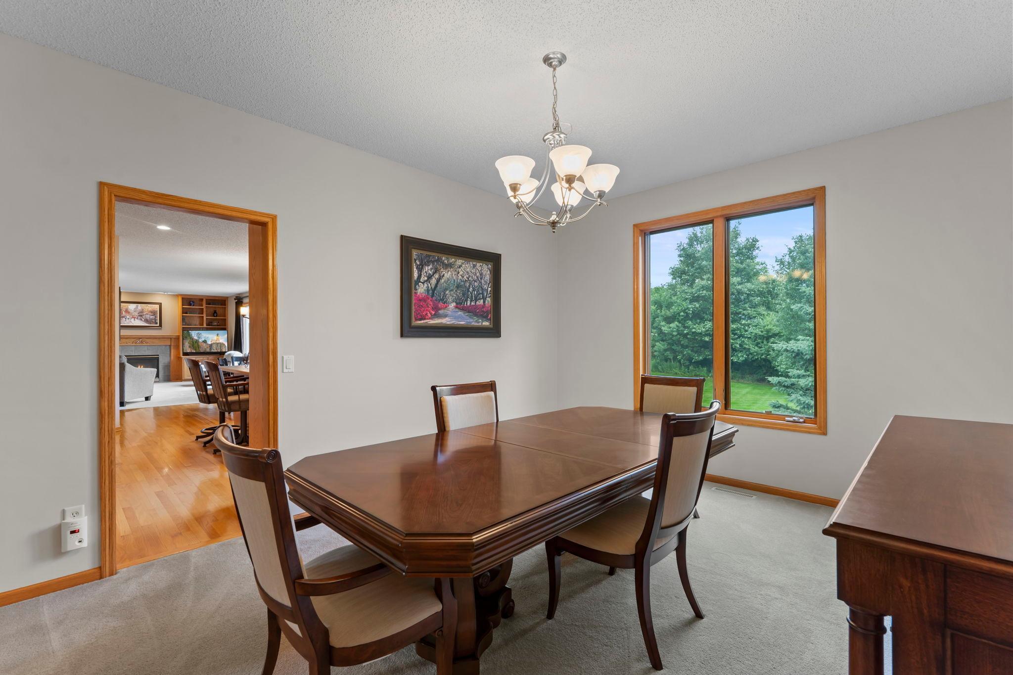 Formal dining room offers great natural light and easy access to the kitchen