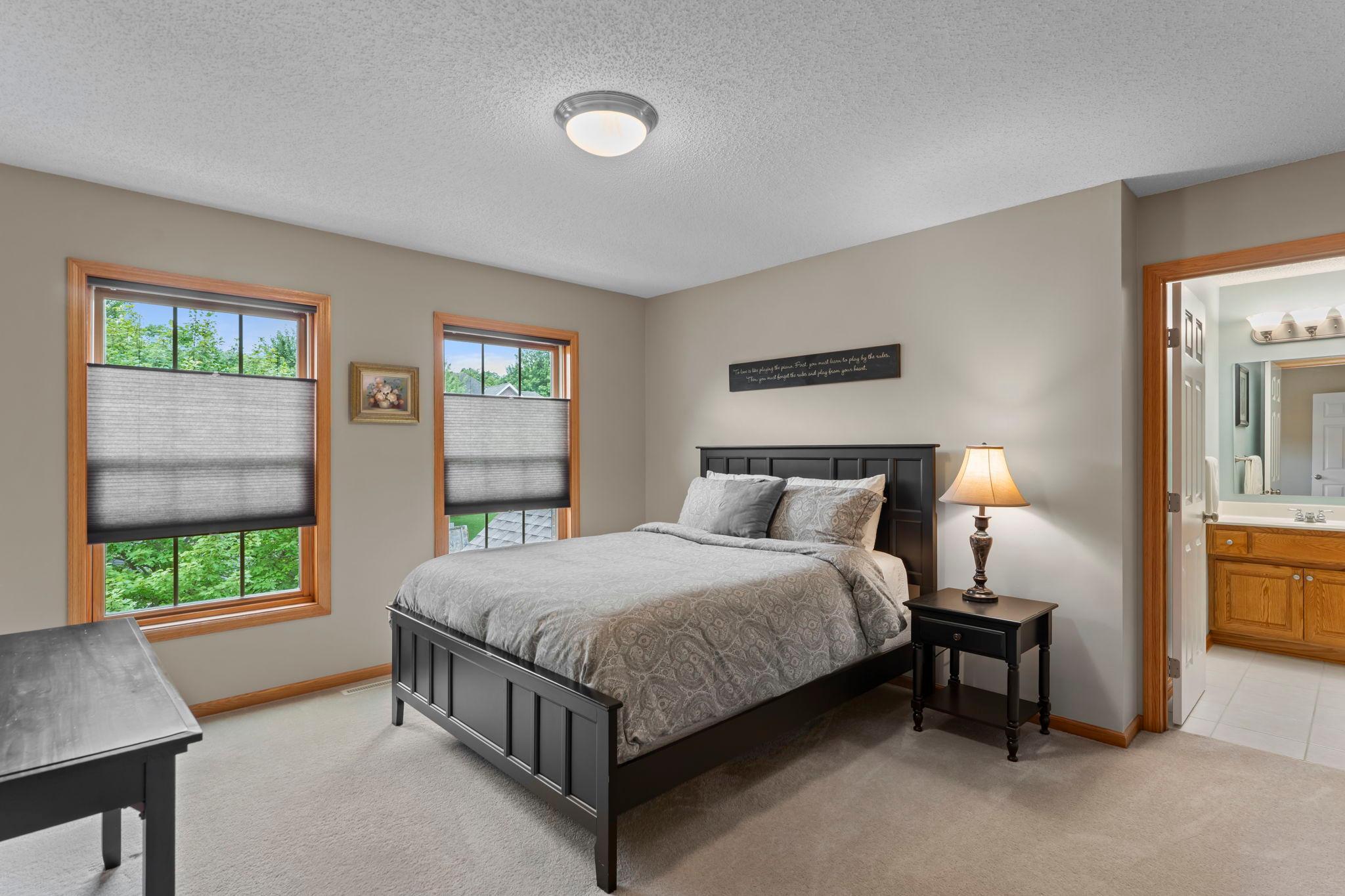 Upper level bedroom 2 with an ensuite bath