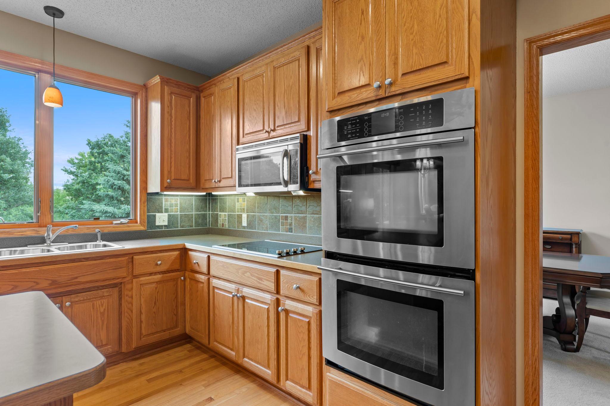 Enjoy double ovens and a flat top stove