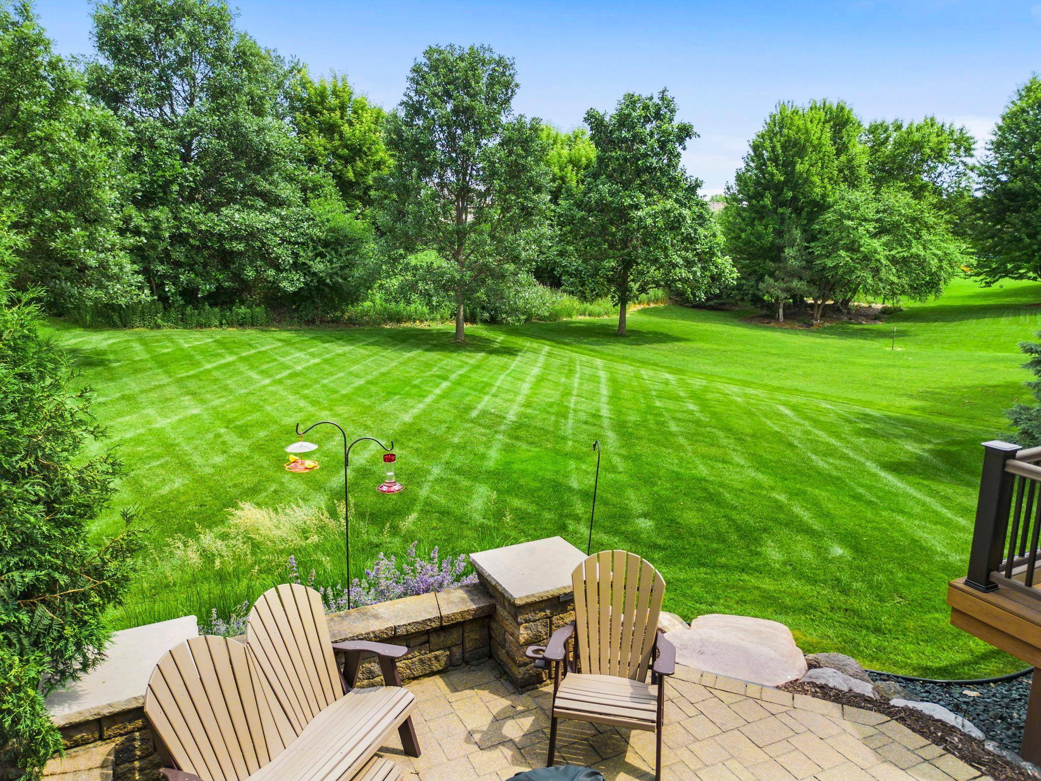 Lush tree-lined backyard offers a sense of solitude