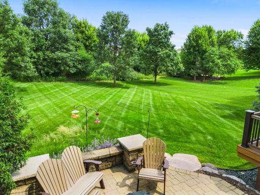 Lush tree-lined backyard offers a sense of solitude