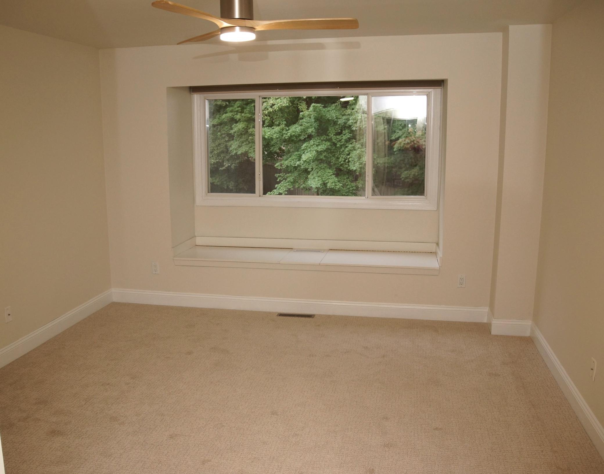 Main Floor en suite with window seat that has storage underneath the benches! It is also freshly painted and has new carpeting!