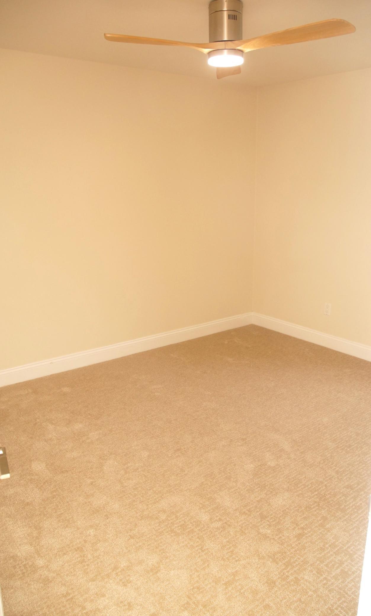 Bedroom 2 sports ample closet space fresh paint and new carpeting!