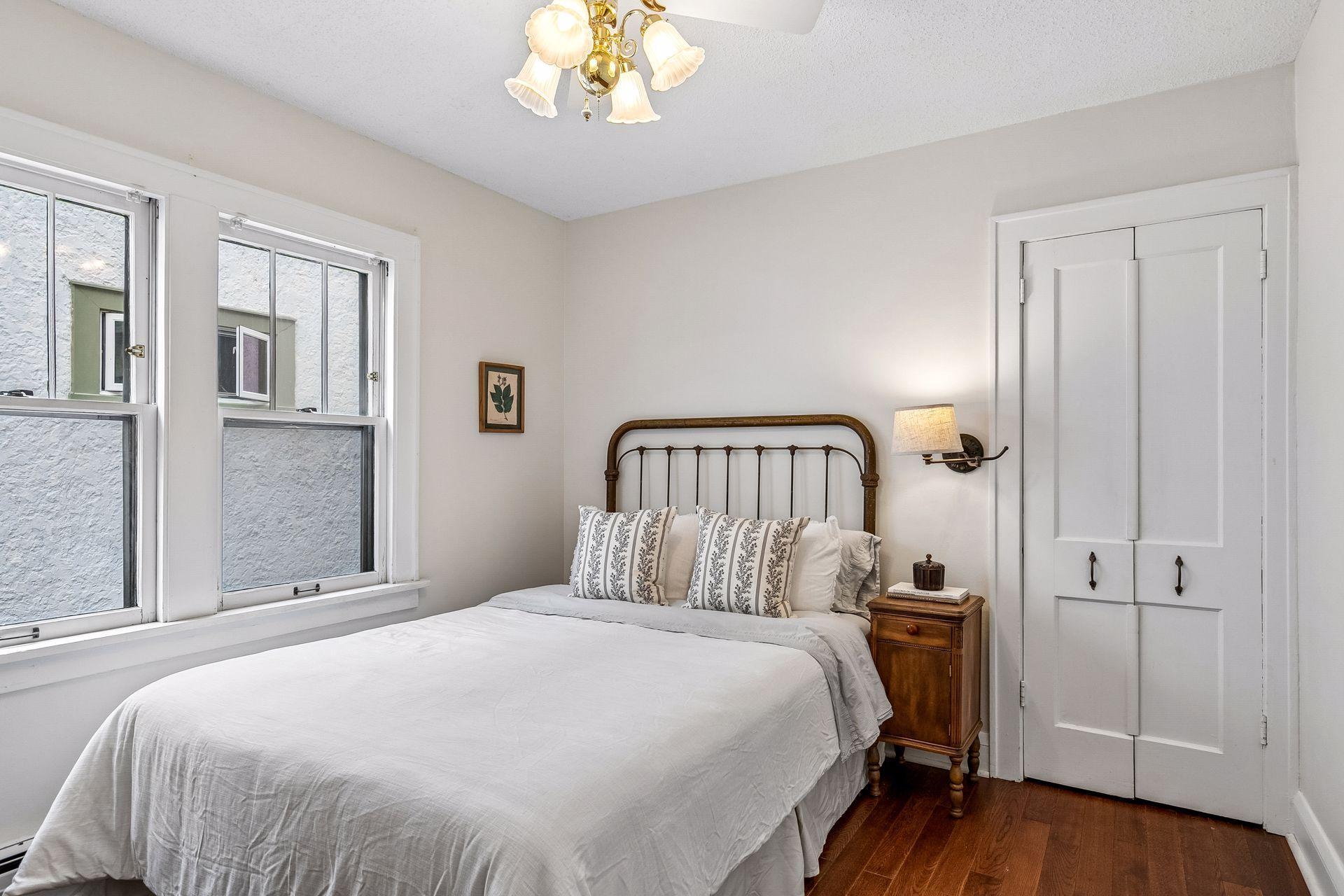 Bedroom 1 with cute French Doors to closet