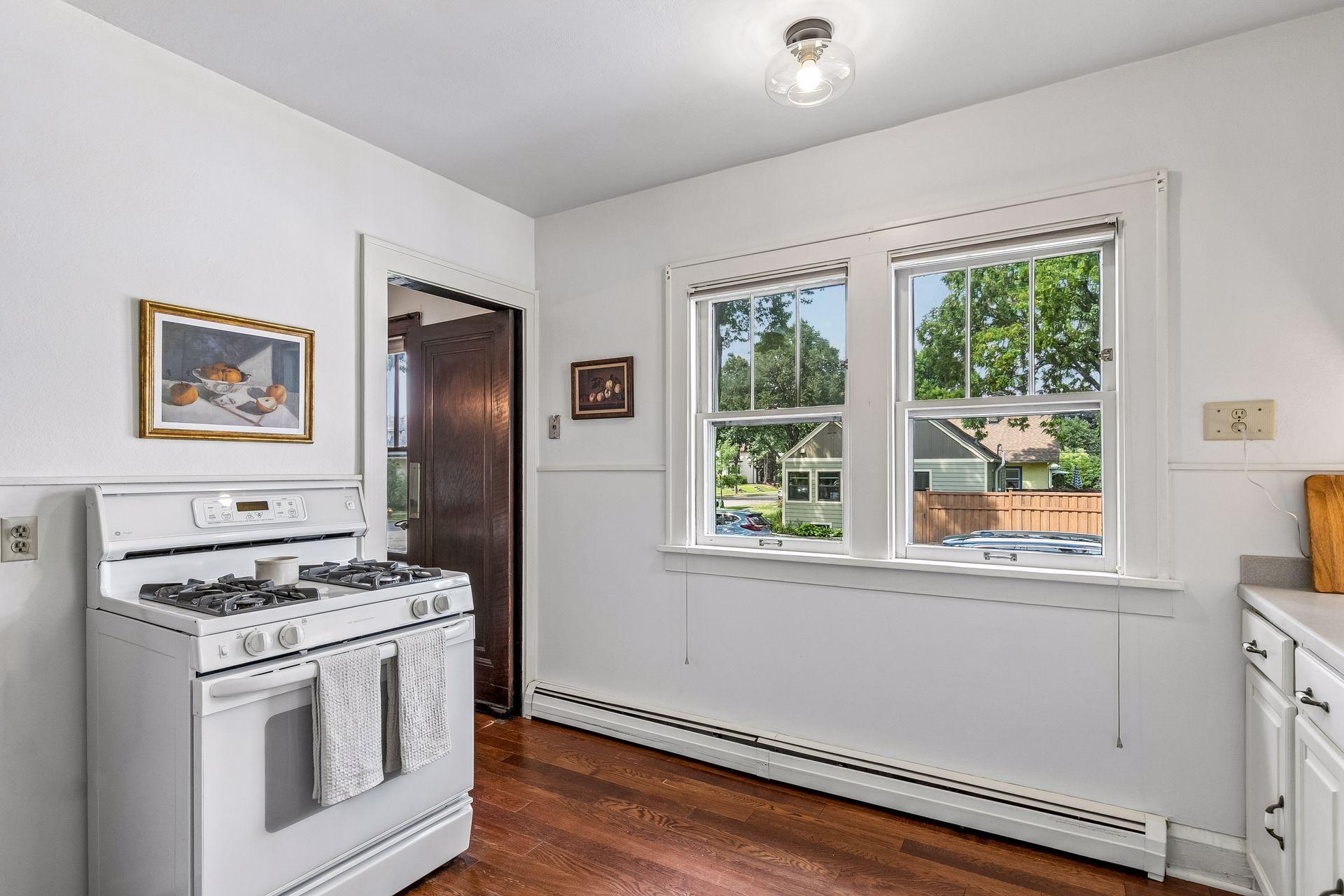 Sunny kitchen with windows over Palace Ave
