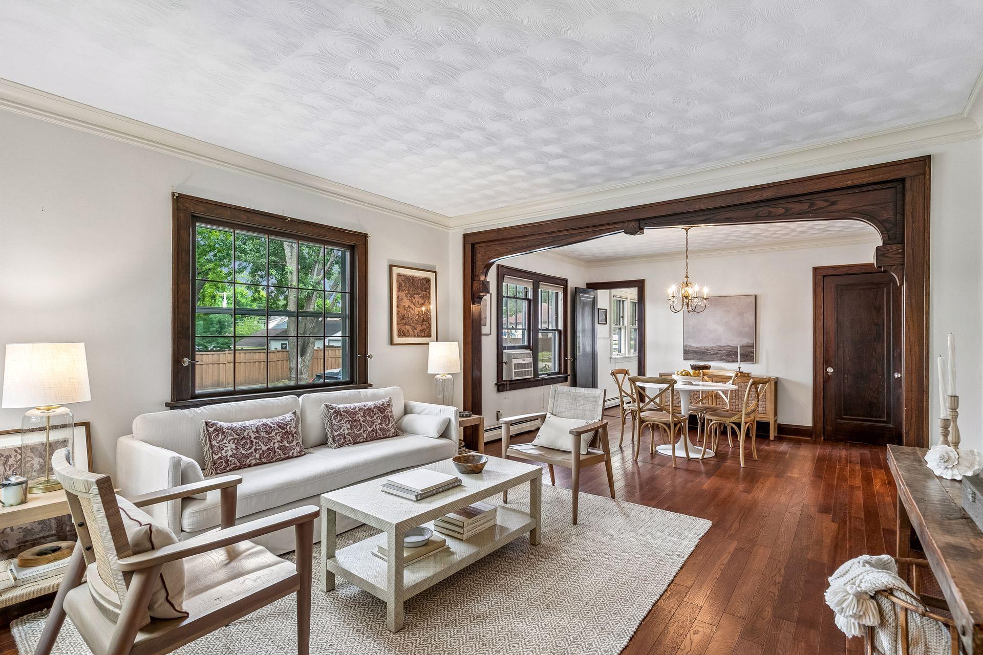 View from foyer across living room towards dining room