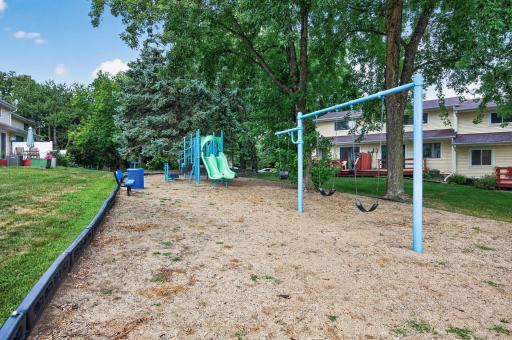 Back patio connects to community playground