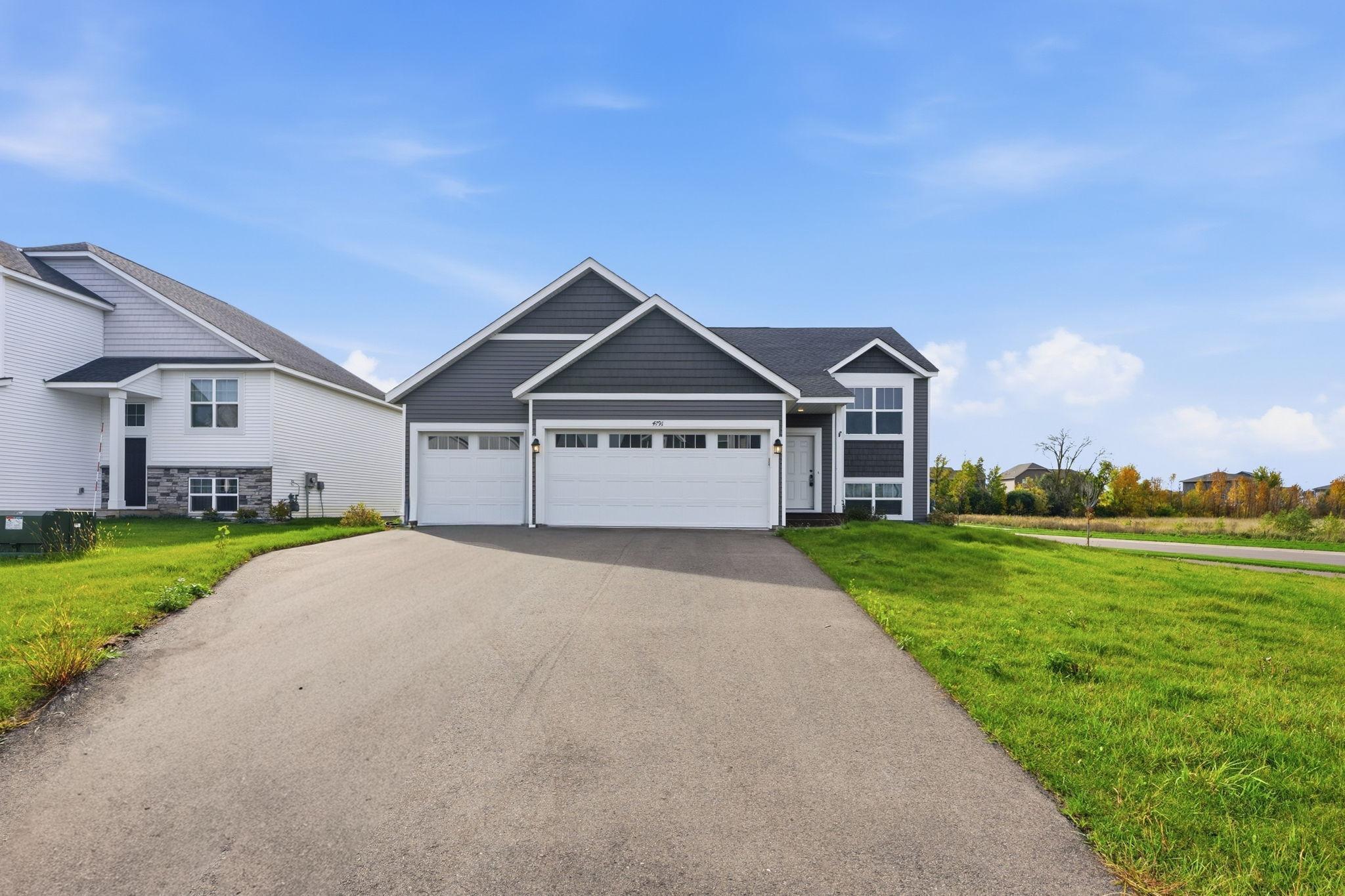 Oversized driveway on a large corner lot; adjacent to peaceful farmland!