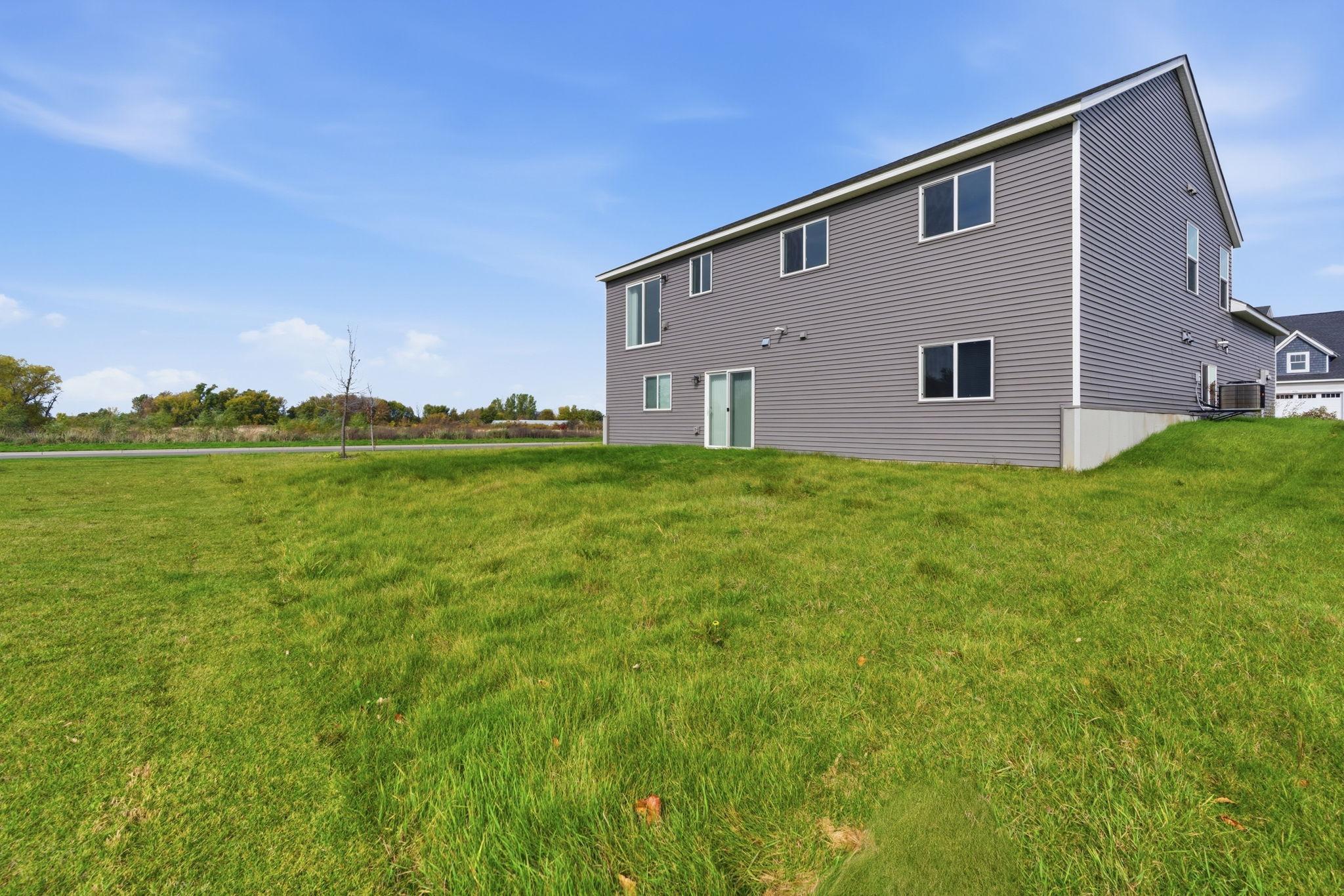 Exterior, quiet lot adjacent to farmland