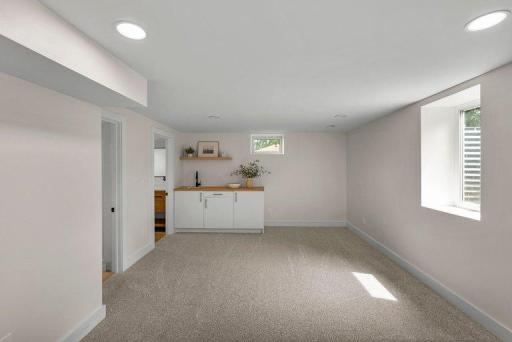 Generous family room creates an ideal setting for relaxing, entertaining, or spending time together.