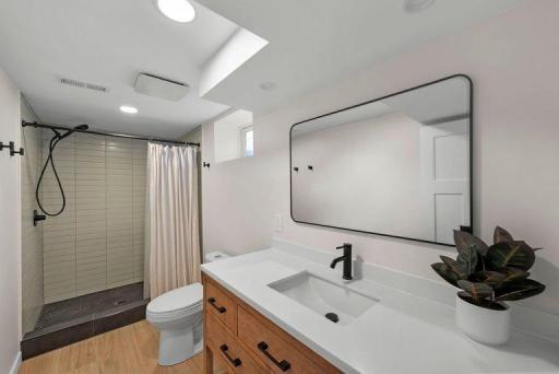 Modern finishes and thoughtful updates create a clean, stylish, and functional bathroom space.