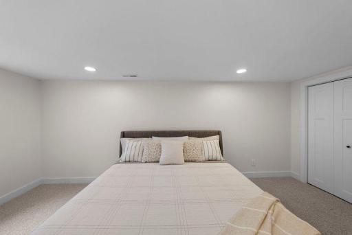 Spacious room offers flexibility to accommodate a variety of lifestyle needs while maintaining the home's contemporary aesthetic.