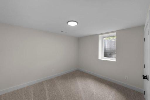 Flexible bedroom space ideal for family, guests, a home office, or other lifestyle needs.