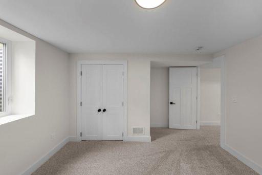 Versatile fifth bedroom provides additional space for guests, a home office, hobby room, or growing household.