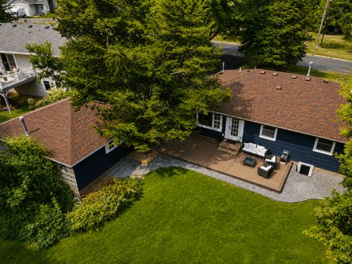Large, level outdoor area offers flexibility for recreation, gatherings, gardening, pets, and future outdoor enhancements.