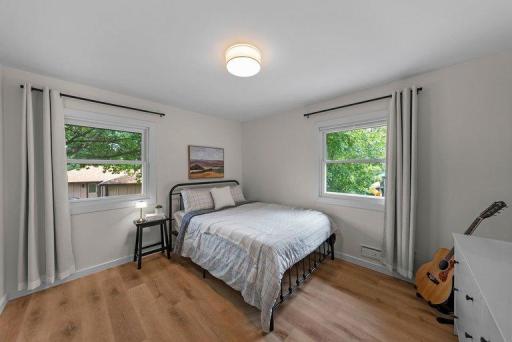 Updated bedroom featuring clean lines, modern finishes, and plenty of natural light.