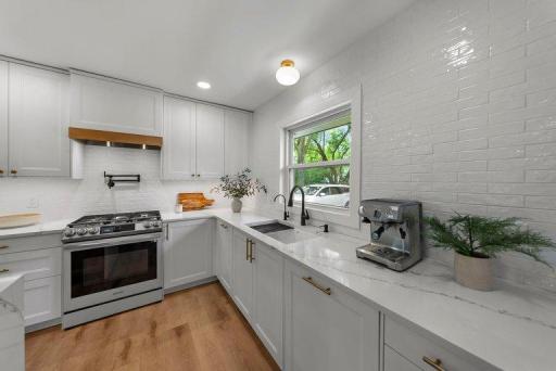 Samsung Bespoke white glass appliances elevate the contemporary kitchen.