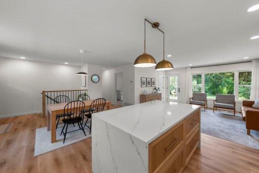 Updated lighting throughout enhances the home’s modern design and creates a bright, welcoming atmosphere.