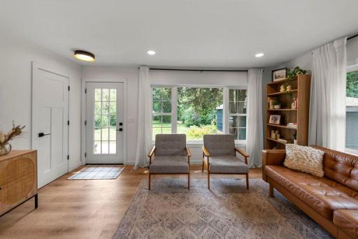 New doors and contemporary interior details complement the home’s completely remodeled aesthetic.