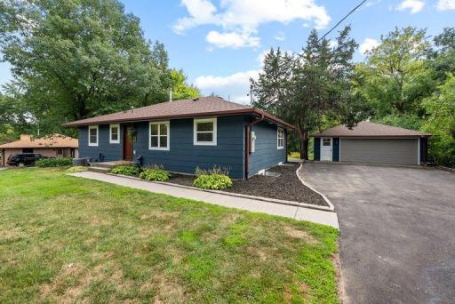 Brand-new driveway provides a clean, updated approach with ample parking for residents and guests.