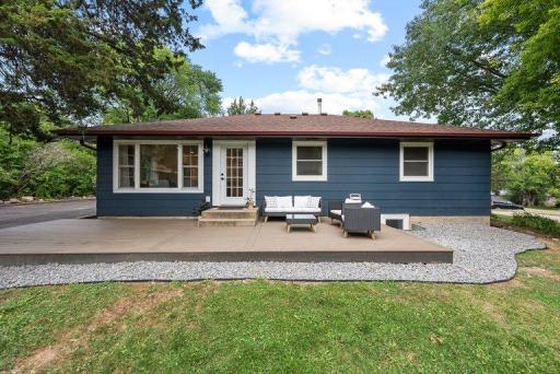 Spacious deck provides an inviting outdoor retreat for dining, entertaining, or relaxing while enjoying the private natural surroundings.