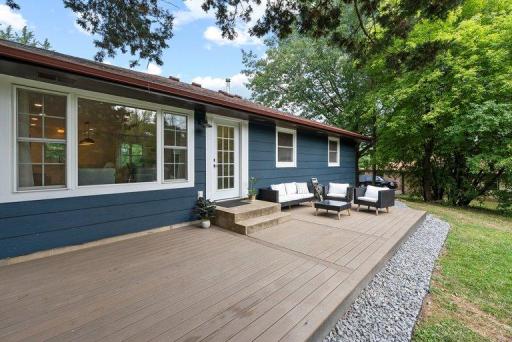 Large deck overlooking the peaceful, park-like backyard.