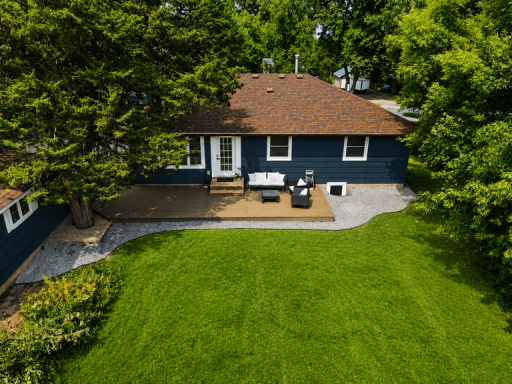 Spacious, park-like backyard offers mature trees, privacy, and plenty of room for outdoor activities and entertaining.
