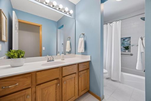 The upper level full bath.