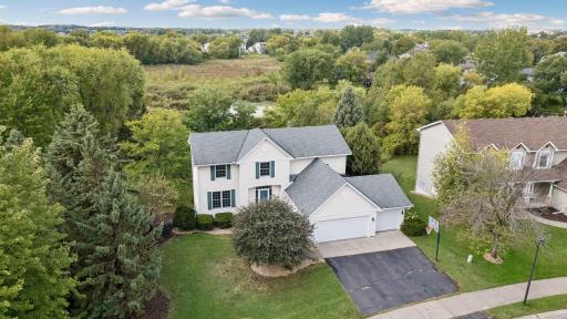 An upper view from the front of the home to the back pond and nature area.